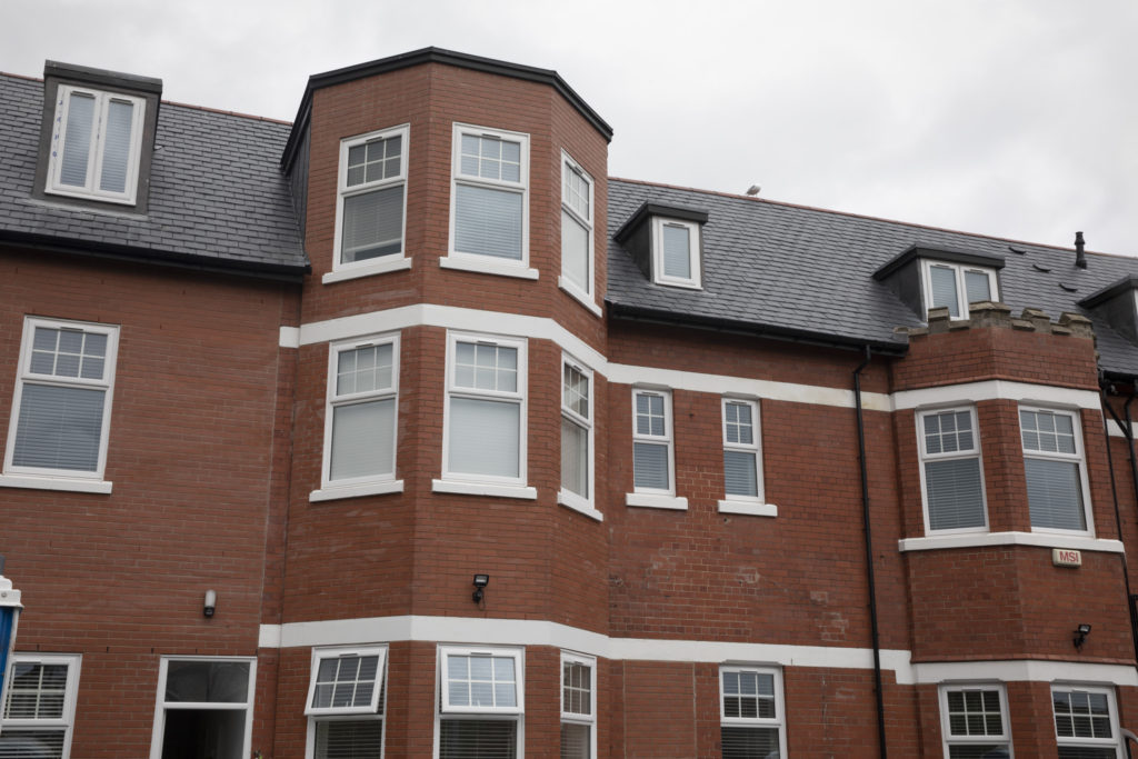 Red brick building, our Conwy Road development