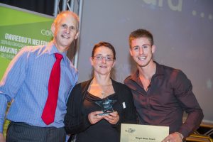 Lydia Watson wins award with Andrew Bowden our Chief Executive and Ash Dykes at our Colleague Conference 2016 at Venue Cymru